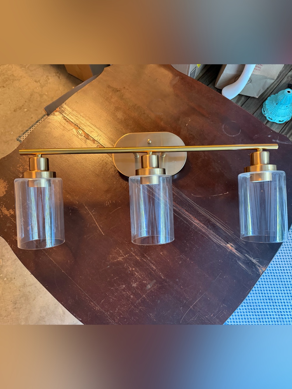 24” 3-Light Brushed Gold Wall Sconce with Clear Glass Shades